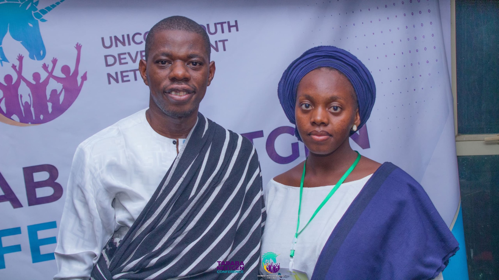 Two delegates in traditional attire