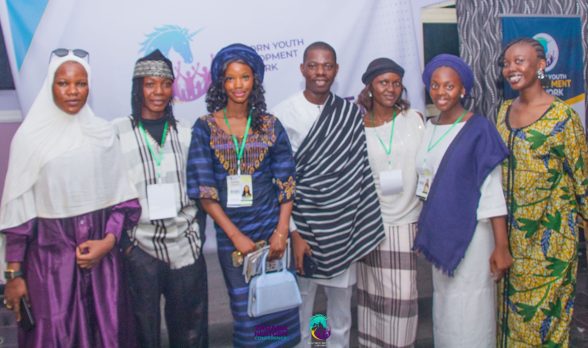 Delegates together in traditional clothing at Tradition Night